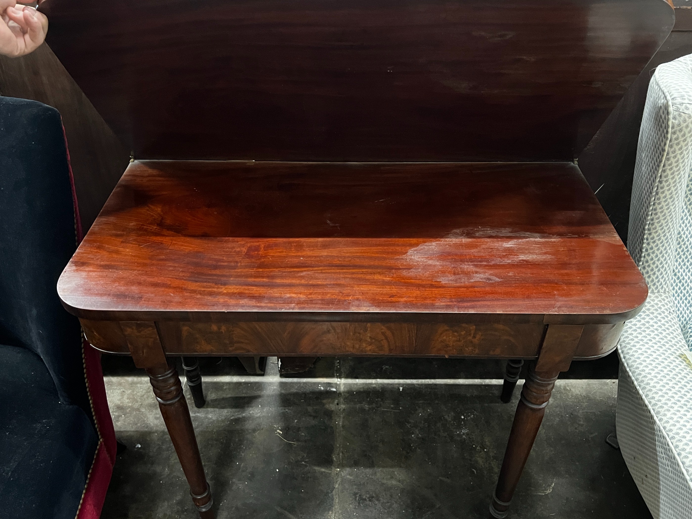 A Regency mahogany folding tea table, width 91cm, depth 45cm, height 75cm